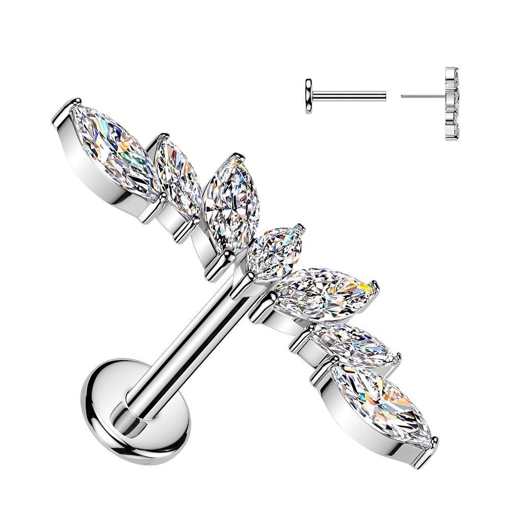 Silver titanium labret with seven marquise-cut clear gemstones in a curved vine