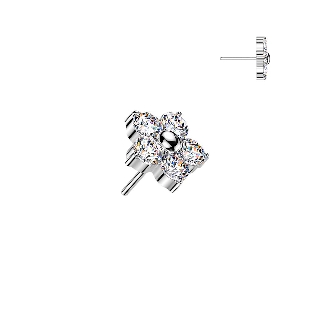 Silver labret with a four-petal flower cluster of clear round gemstones